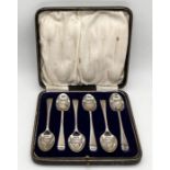 A cased set of hallmarked silver coffee spoons