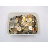 A collection of loose UK and worldwide coinage.