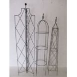 Three wrought metal garden obelisks