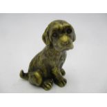 A small vintage bronze figure of a puppy