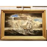 An unsigned oil on board painting of a sailing ship on a rough sea in a gilt frame. Overall size