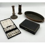 A collection of silver-plated cutlery, copper candlestick, tray etc.