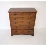 A Victorian mahogany chest of five drawers, length 82cm, height 90cm, depth 39cm.