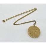 A large 9ct gold locket on 9ct gold chain, total weight (including glass) 14.8g