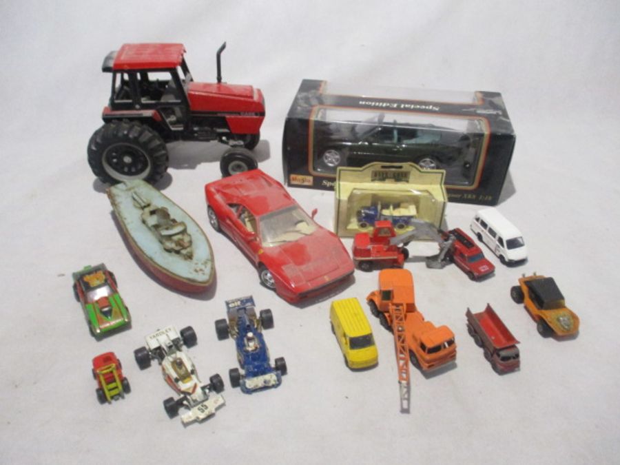 A collection of various die-cast including a boxed Maisto Jaguar XK8 (1:18 scale), large