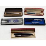 A small collection of vintage pens etc. including Sheaffer, Osmiroid and Parker