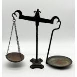 An antique set of cast iron and brass scales