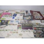A collection of stamps and first day covers including The Olympic Masterfile, Royal Events, two sets