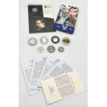 A collection of coins including silver proof Oliver Cromwell £5, silver proof Revolution to