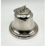 A hallmarked silver inkwell in the form of a bell with opaque glass liner, dated Birmingham 1924