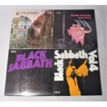 Four Black Sabbath 12" vinyl records, comprising 'Black Sabbath', 'Paranoid', 'Master Of Reality'