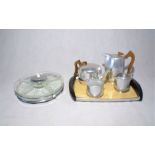 A Picquot ware four piece tea set and tray, along with a lazy susan.