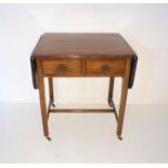 A mahogany drop leaf side table with two drawers.