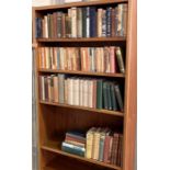 A large collection of vintage books over four shelves including a penguin paperbacks, fiction