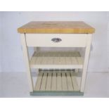 A butcher's block with single drawer.