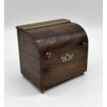 A small early 19th Century Mahogany tea caddy in form of cylinder bureau on brass feet