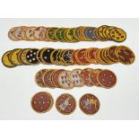 A collection of Indian Ganjifa playing cards with hand painted detail - approximately 96 cards