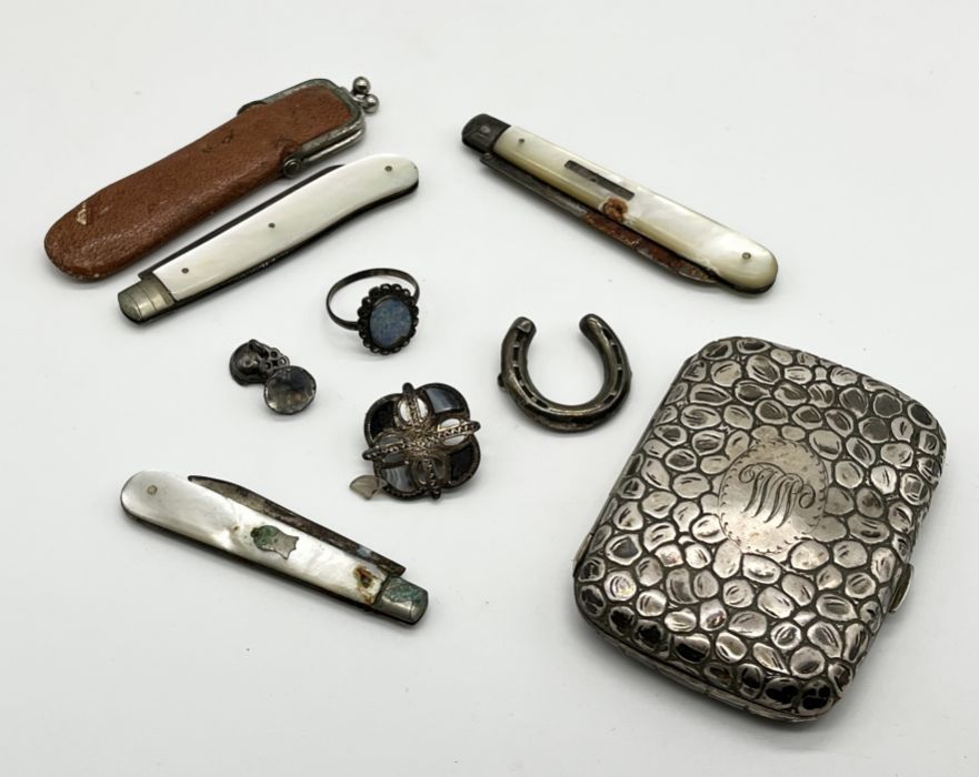 A hallmarked silver cigarette case along with three silver bladed fruit knives etc.