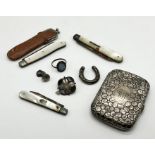 A hallmarked silver cigarette case along with three silver bladed fruit knives etc.