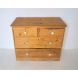 A pine chest of four drawers, length 83cm, height 71cm.