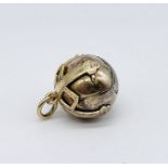A gilt metal Masonic metamorphic orb fob which opens out to form a cross - 16mm diameter or 5cm long