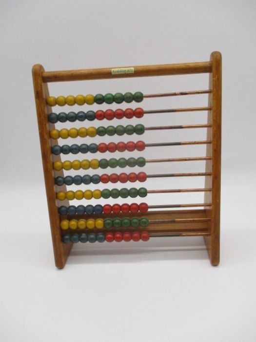 A vintage wooden Kiddicraft abacus - height 31cm