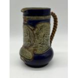 An early 20th Century Royal Doulton stoneware Lord Nelson commemorative jug with blue colouring