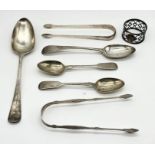 A collection of hallmarked silver cutlery including two pairs of Georgian sugar nips, napkin ring