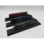 A collection of three OO gauge model railway locomotives on stands including 1936 GWR Earl