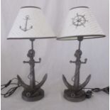 A pair of modern lamps in the form of anchors