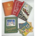 Four sales albums of vintage greetings/Christmas cards with mounted examples including Medici, also