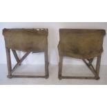 Two handmade rustic saddle stands.