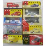 A collection of boxed die cast Morris Minor cars and vans including Vanguard, Eddie Stobart, Corgi