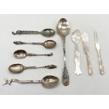 A small collection of silver spoons etc. (silver weight 89.5g)