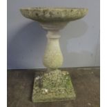 A reconstituted stone bird bath in three parts. Height 69cm