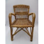 A vintage child's wicker chair