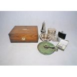 A wooden box along with a wine coaster, candle holder, hipflask etc.