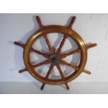 A vintage brass bound ships wheel, diameter of wheel 80cm (total 106cm)