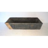 An antique elm cider trough, length 170cm, width 62cm, height 36cm.