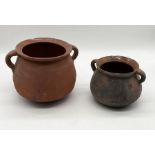 Two African style terracotta two-handled cooking pots
