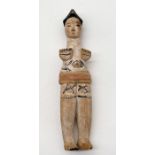 A carved wooden Nigerian Ibibio doll - length 28cm.