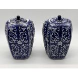 A pair of Chinese blue and white gourd shaped ginger jars with character marks to base - Height