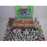 A boxed vintage Timpo Toys Wild West Fort with a selection of cowboy & Indians plastic toy