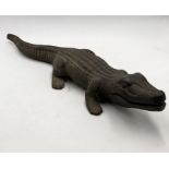 A cast iron crocodile 72cm in length