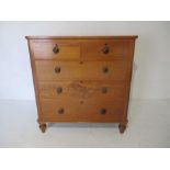 A Victorian oak chest of five drawers