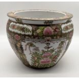 A Chinese Famille Rose fishbowl with traditional scene and floral detail, character mark to base -