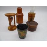 A small collection of treen including Gilbertson of London, Mauchline ware, egg timer etc.