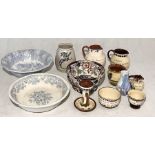 A collection of various china including Torquay ware, Portland ware etc.