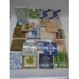 A collection of 24 antique tiles including Maw & Co. Mintons etc. - some A/F