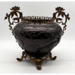 A Japanese Meiji period bronze planter with raised bird motif, gilt metal handles and character mark
